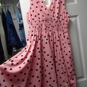 Melon and black poka dot dress